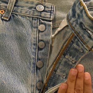 501 Levi’s jeans have minor damage